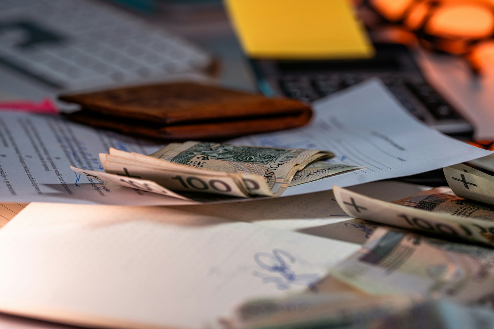 Money and financial documents on a desk